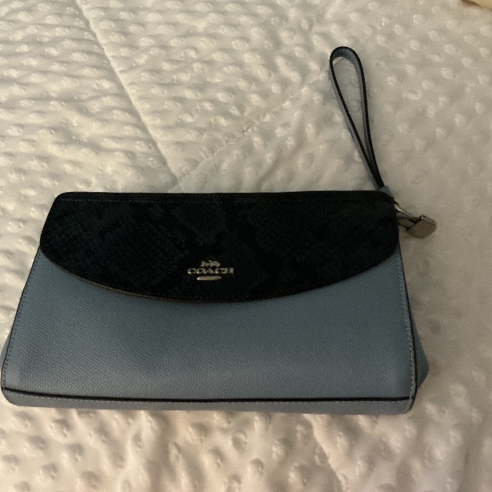 Brand new Beautiful two color coach clutch